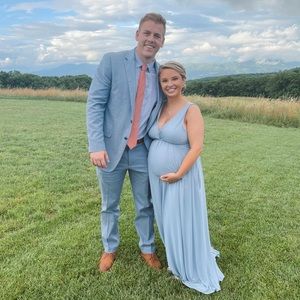 Altered gown. Wearing a size large, I am 5ft even